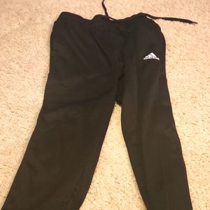 Adidas sweat pants.